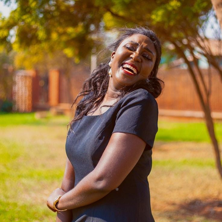 Aarya Malik, Lead Design Curator at Mosaic Bench Studio, reviewing corporate floral arrangements